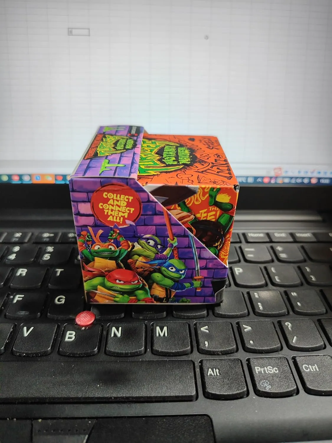 SHASHIBO Teenage Mutant Ninja Turtles Shape Shifting Box - STEM Magnetic Fidget Cube That Transforms Into Over 70 Shapes, Download Fun in Motion Toys Mobile App (Mikey)