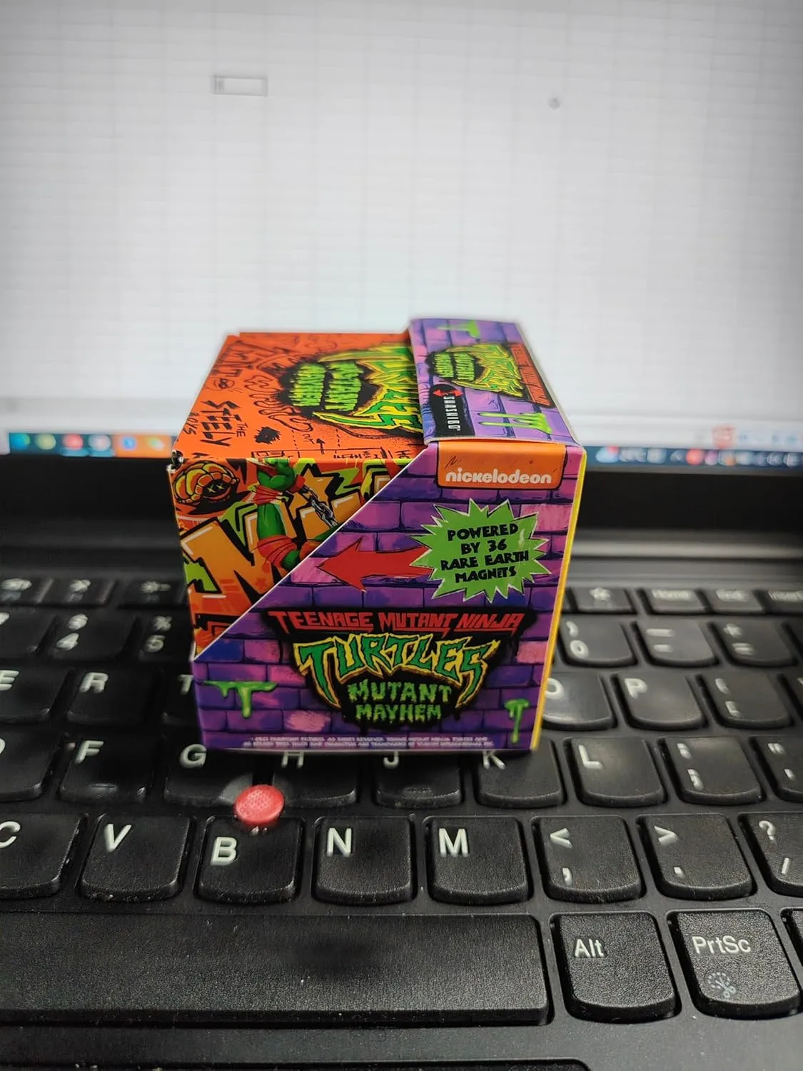 SHASHIBO Teenage Mutant Ninja Turtles Shape Shifting Box - STEM Magnetic Fidget Cube That Transforms Into Over 70 Shapes, Download Fun in Motion Toys Mobile App (Mikey)