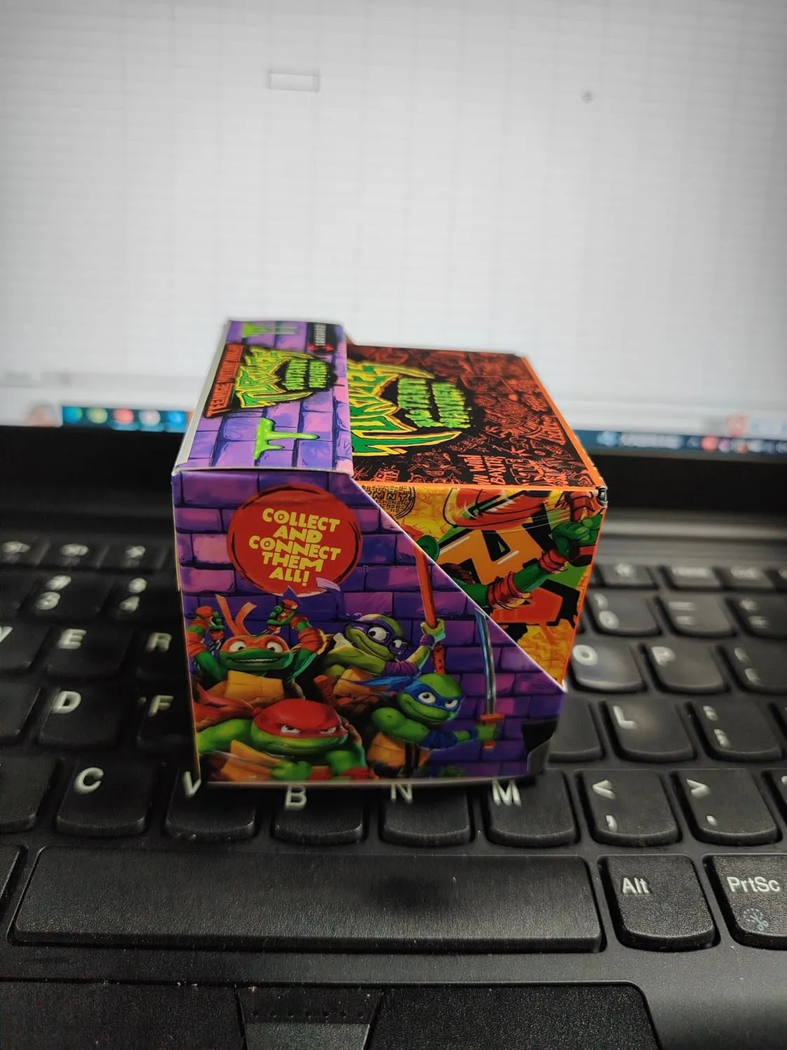 SHASHIBO Teenage Mutant Ninja Turtles Shape Shifting Box - STEM Magnetic Fidget Cube That Transforms Into Over 70 Shapes, Download Fun in Motion Toys Mobile App (Mikey)